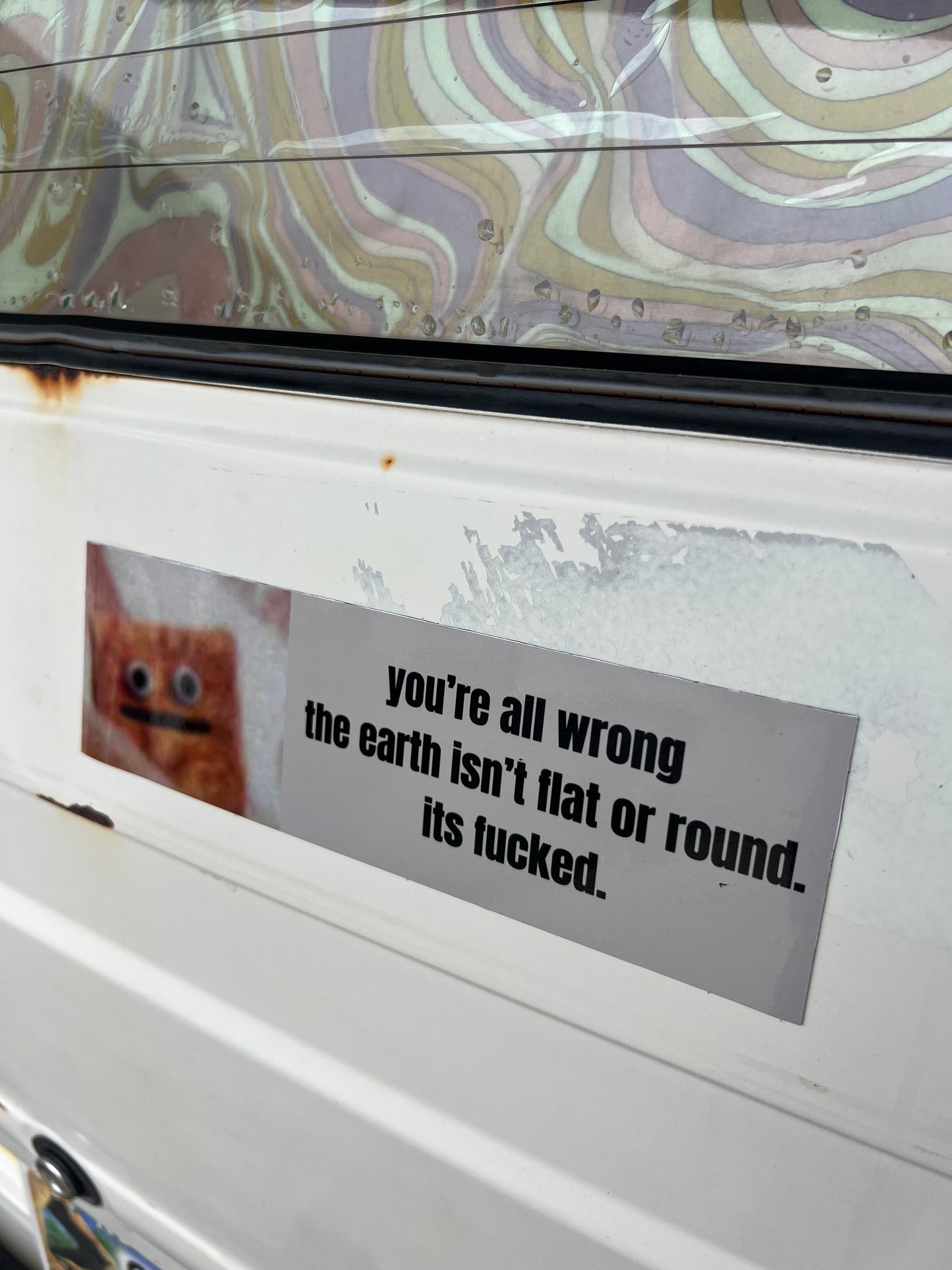 the earth isnt flat or round its fucked sticker